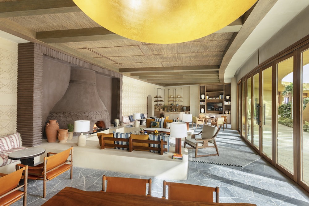 a comfortable lounge area with sofas and chairs