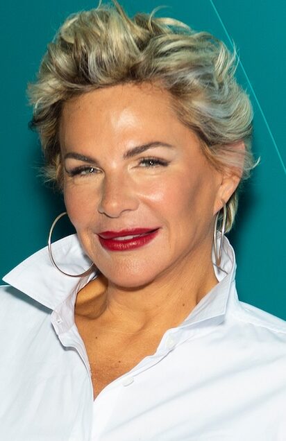 Woman in white shirt with bright red lipstick