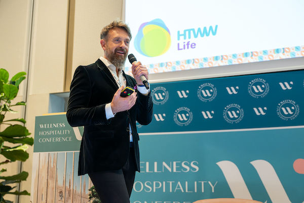 Man Speaking on Stage