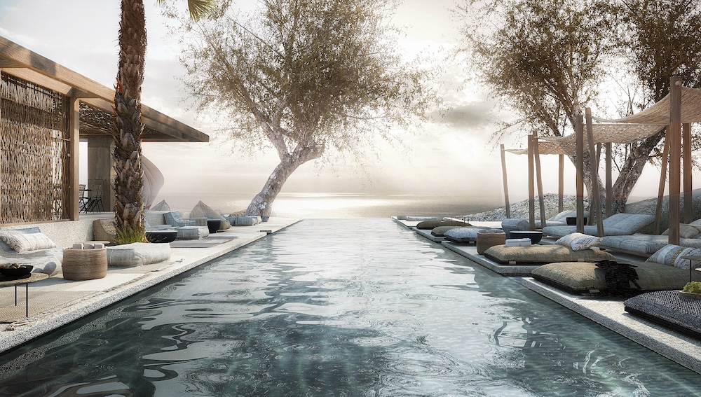 A steaming outdoor pool surrounded by trees