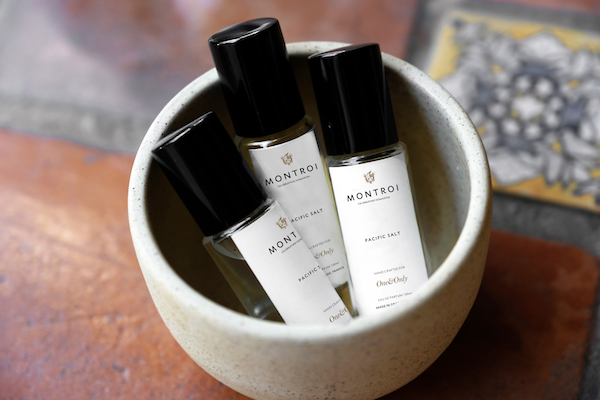 fragrance bottles in a bowl