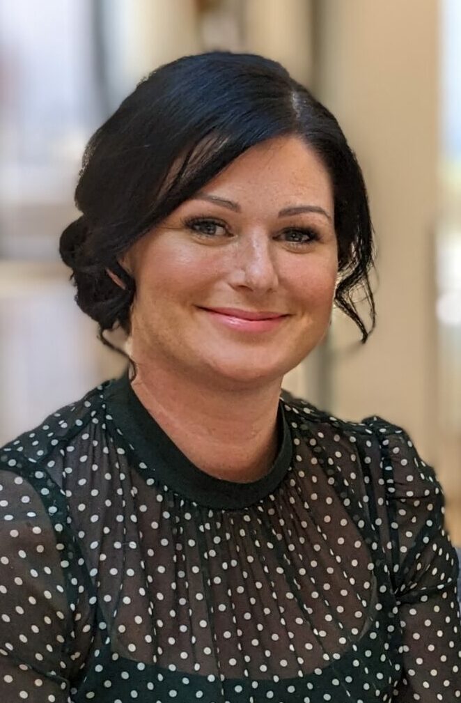 head of spa woman in spotted top