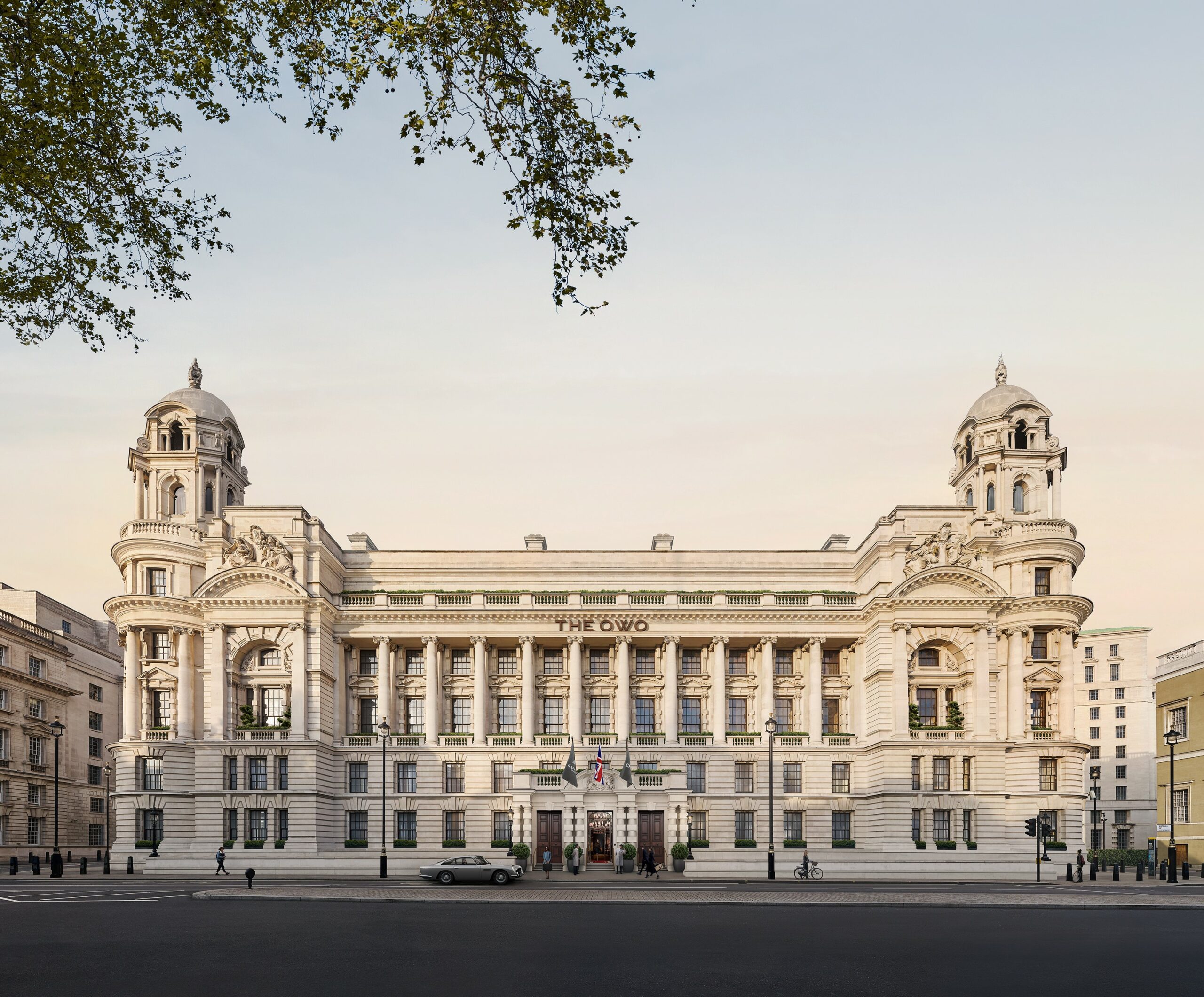 Picture of Raffles London at The OWO, a grand looking hotel building in London with a clear sky in the background